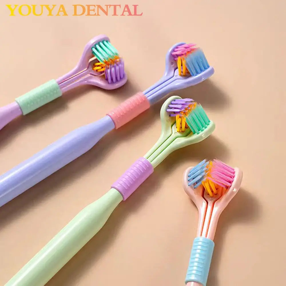 Colorful toothbrushes with 'YOUYA DENTAL' branding on a beige background