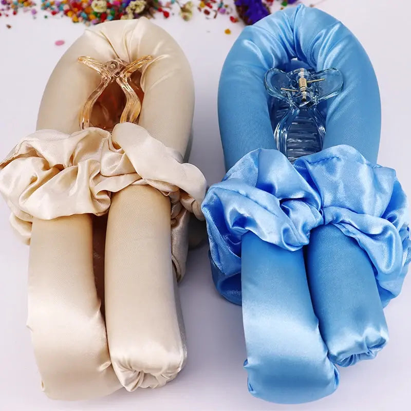 Beige and blue satin slippers with ruffles on a white background