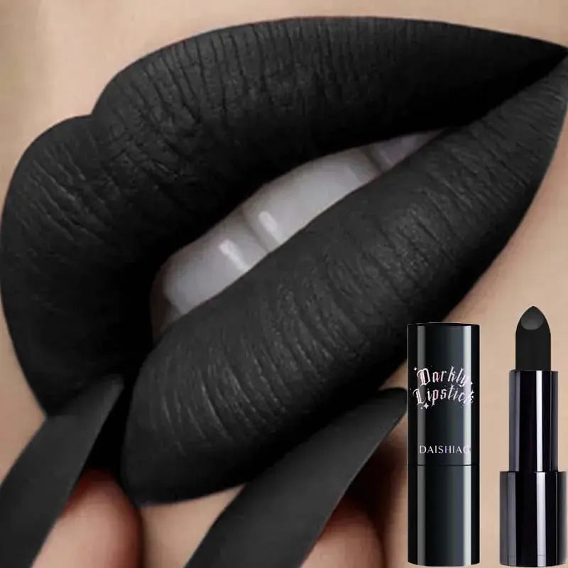 Black lipstick applied to lips with a close-up of the lipstick and brand name.